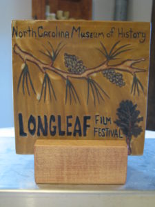 Meredith Heywood, Whynot Pottery, created our 2018 Longleaf Film Festival award tiles